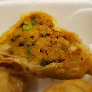 Vegetable samosas peek inside