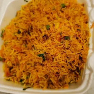 The bold flavorful/delicious/spicy mehfil special biryani, so good