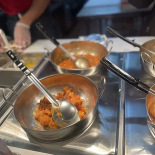 a variety of dishes being prepared