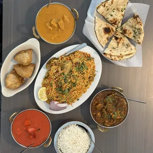 Samosa, tikka masala, butter chicken, chicken curry, biryani and garlic naan everything was delicious