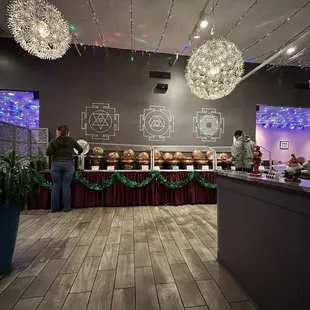 a buffet area with a variety of food items