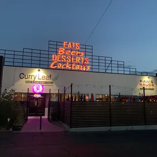 Exterior. Facing Menaul but set back from the street. Parking in front.