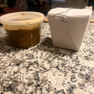 To-go order of the Palak with chicken