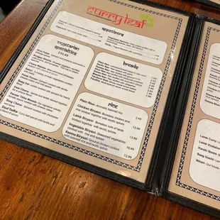 menus on a wooden table
