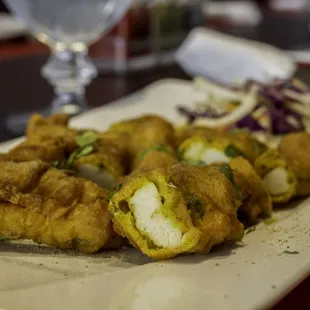 fried food on a white plate