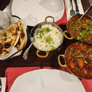 Garlic naan, rice, goat curry, chicken vindaloo