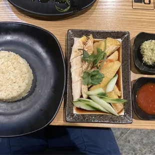 Hainanese chicken with rice.