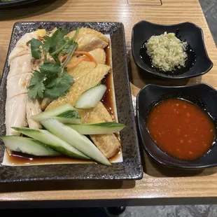 Hainanese chicken with rice.