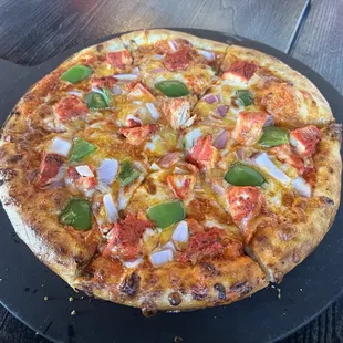 Chicken tikka deluxe pizza