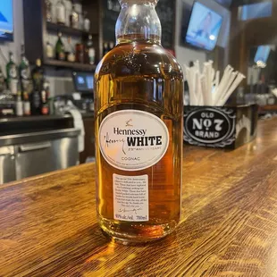 a bottle of henney's white