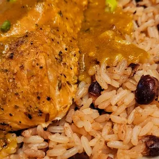 Curry salmon over rice and peas delicious