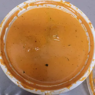 two bowls of soup on a table