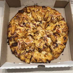 Chicken achari pizza is delicious