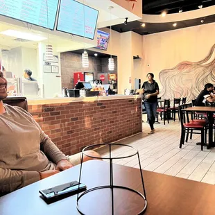 a man and a woman sitting at a table