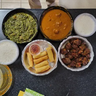 Lamb Saag, Goat Curry, Lasuni Gobi, Veggie Spring Rolls, Basmati Rice