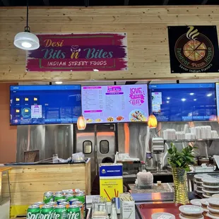 a view of the counter area of a restaurant