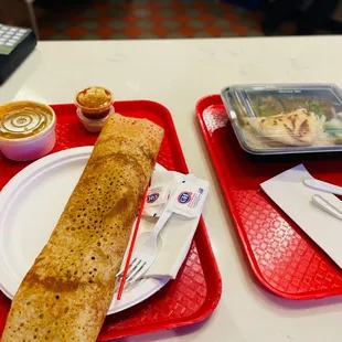 two trays of food on a table