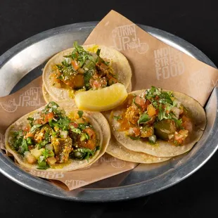 three tacos on a plate