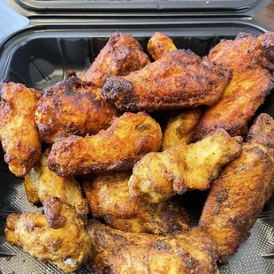 Top: tandoori chicken wings; bottom: curry chicken wings