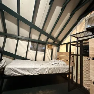 One of the beds, they provide bedding and blankets but I'd recommend bringing your own