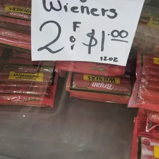 a display of a variety of hot dogs