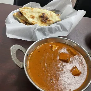 Paneer Tikka Masala (vegetarian option), delicious! It&apos;s like a creamy tomato soup with cheese. Mmmmm! Make sure you get naan to go with it!