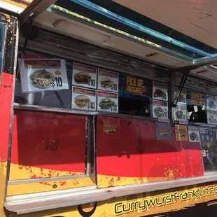 a yellow and red food truck