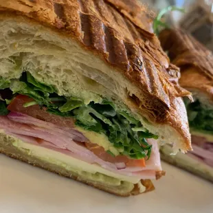 a cut in half sandwich on a plate