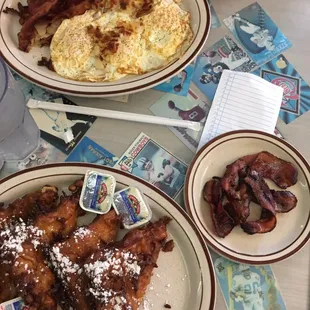 two plates of breakfast food