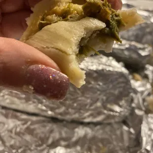 The last bite of my green chili tamale