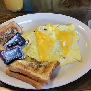 Omelet made on a flat top grill instead of in a pan. But it tasted good.