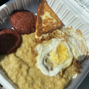Mangú with fried eggs, cheese and salami