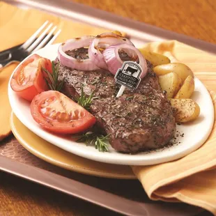 Certified Angus Beef New York Strip Steaks. shown prepared