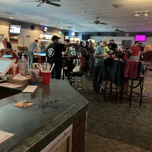 people sitting at a bar