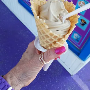 I chose the German chocolate soft serve with coconut shaved flavoring, in a waffle cone. Smells delicious too!