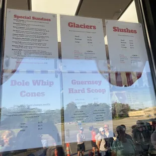 menus on the window of a restaurant