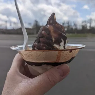 Summer's almost here! This medium frozen custard (I think they're getting smaller) was unfortunately not well coated in chocolate.