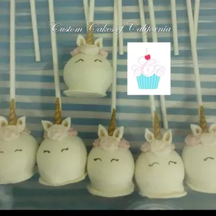 cake pops with unicorns on them