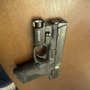 The S&amp;W 9mm C. (The color fill was done by me after purchase and rail light/laser added after purchase as well).