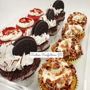 Cupcakes red velvet with cream cheesecakes, cookies n cream, pumpkin spice with cream cheese and sugared pecans