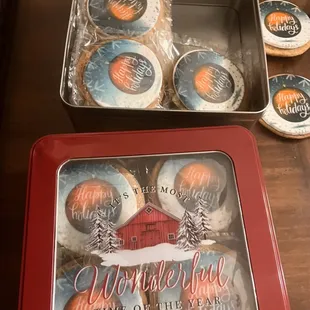 a box of cookies and a cookie tin