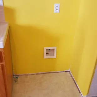 Repainted with baseboards soon to follow. Yes, part of our kitchen is yellow.