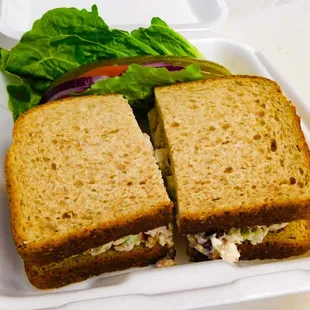 a sandwich in a styrofoam container