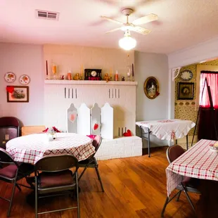a dining room with a fireplace