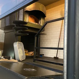 Wood burning oven! They use almond which adds a nice flavor to the dough.