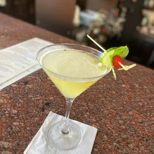 a martini with a garnish garnish garnish garnish garnish garnish garn