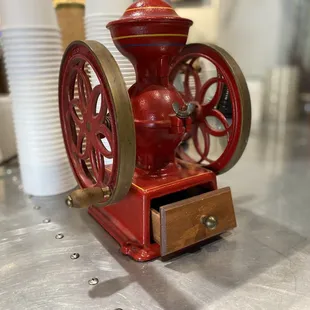 a red coffee grinder