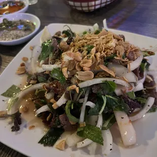 a plate of salad on a table