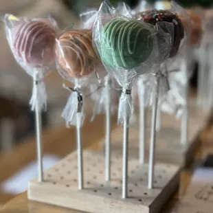 a variety of lollipops on sticks