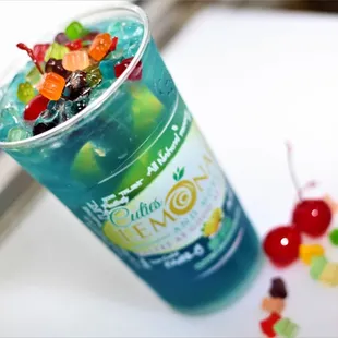 BLUE CHERRY GUMMY BEAR LEMONADE Blue Raspberry Lemonade mixed with Maraschino Cherries and a variety of gummy bears mixed with granulated